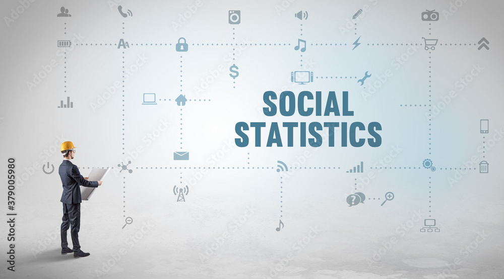 Engineer working on a new social media platform with SOCIAL STATISTICS inscription concept Engineer working on a new social media platform with SOCIAL STATISTICS inscription concept