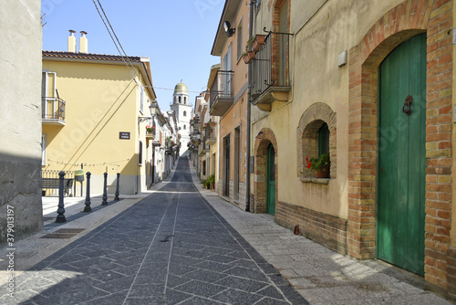 A narrow street among the old houses of San Bartolomeo in Galdo, a rural village in the Campania region, Italy.  © Giambattista