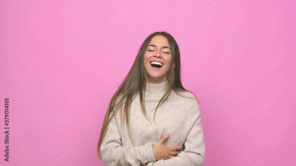 Young cute woman relaxed and happy laughing, neck stretched showing teeth