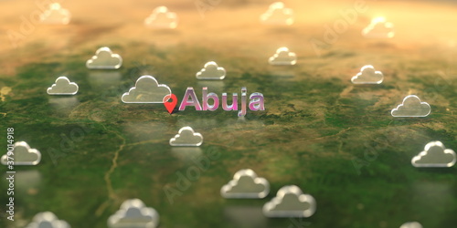 Abuja city and cloudy weather icon on the map, weather forecast related 3D rendering © Alexey Novikov