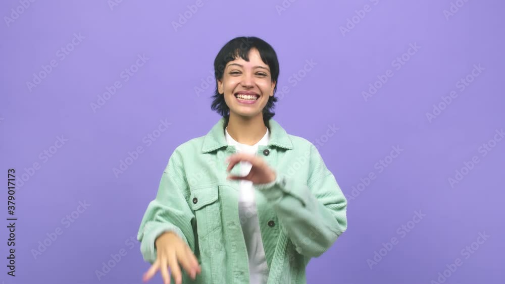 Young caucasian woman cheerful and confident doing ok gesture on eye, excited and screaming, concept of approval and success Young caucasian woman cheerful and confident doing ok gesture on eye, excited and screaming, concept of approval and success