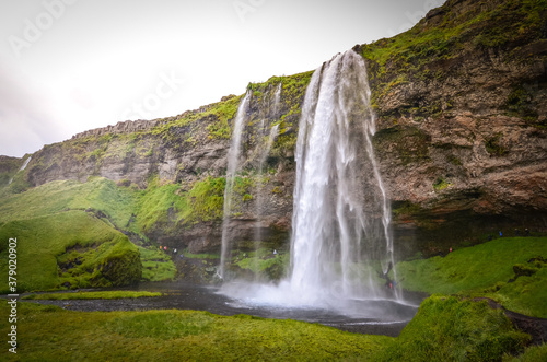 The photo shows beautiful Seljalandfoss waterfall in Iceland.