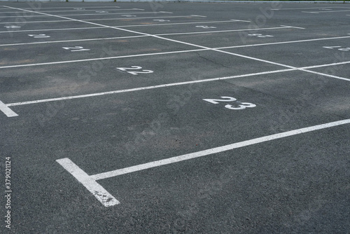 White markings and numbering in the Parking lot.