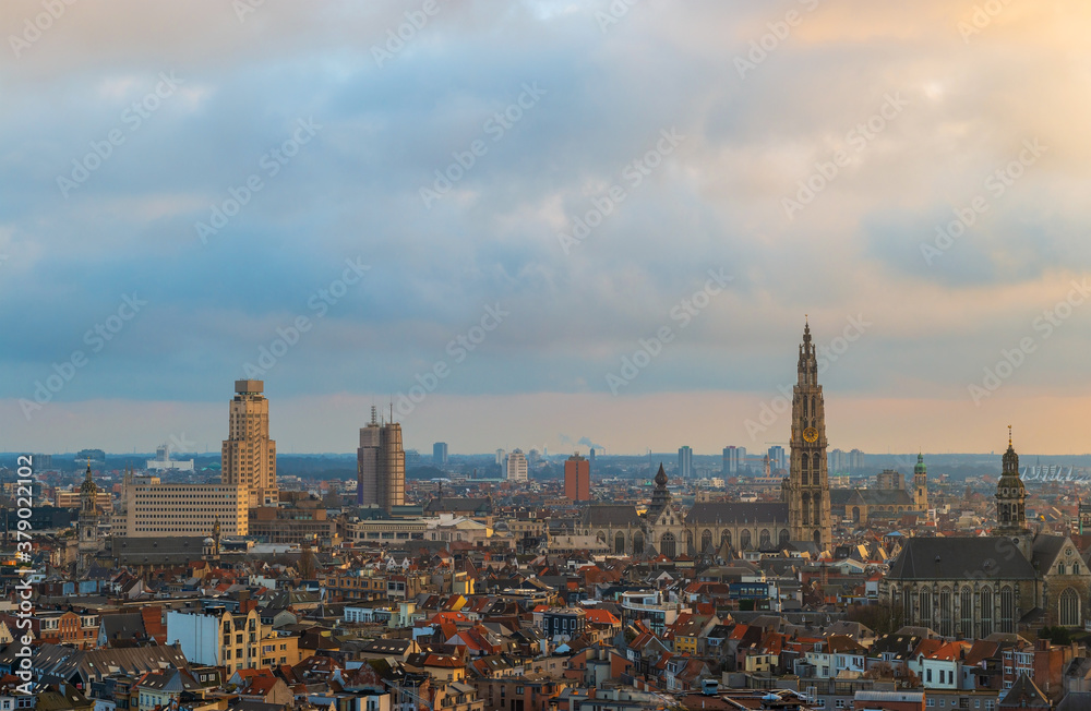 Cityscape of Antwerpen (Antwerp) at sunset with the cathedral tower, Belgium.