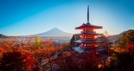 Panorama of Kawaguchiko on a Sunny autumn day. Kawaguchiko mountain area. Golden autumn in Japan. Chureito pagoda in Fujiyoshida. City at the foot of mount Fuji. Pagoda and autumn trees in Japan.