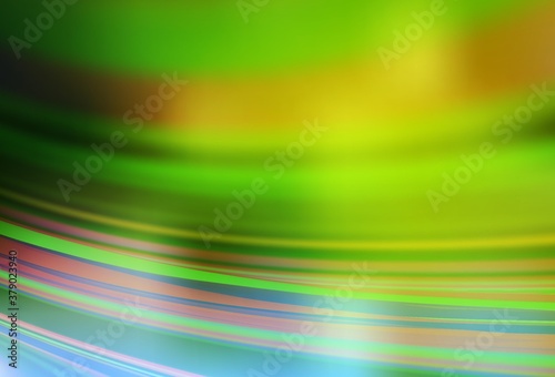 Light Green  Yellow vector blurred shine abstract template.