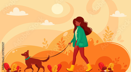 Black woman walking with dog in autumn. Autumn park. Vector illustration in flat style. © Amahce