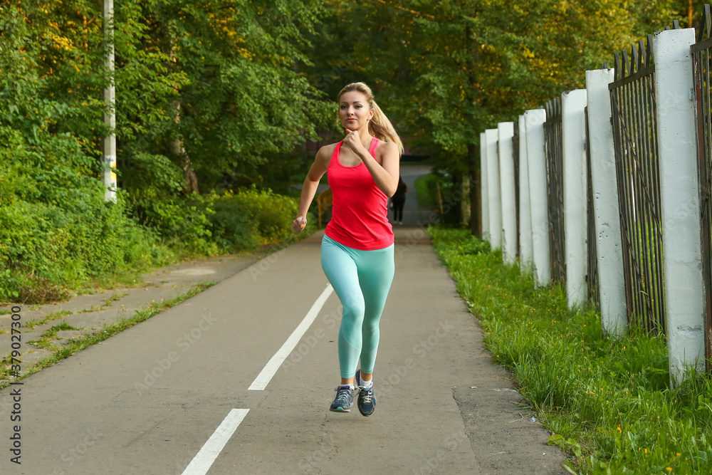 young sport woman is running outdoor
