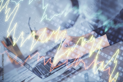 Multi exposure of woman hands typing on computer and financial chart hologram drawing. Stock market analysis concept.