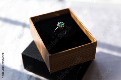emerald stone diamond ring in gift box  © Kazime