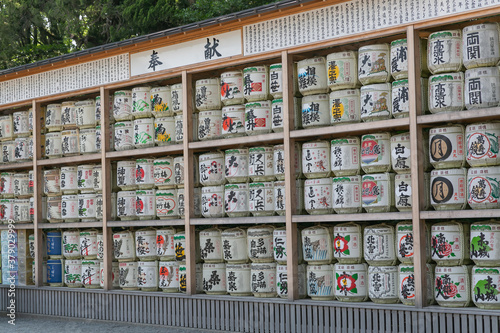 many displayed traditional sake barrels in shrine of kamakura in kanagawa prefecture, japan