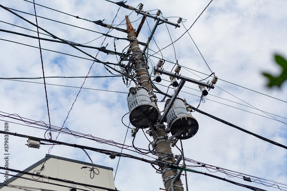 Photography power lines and pole, cloudy sky in tokyo, japan