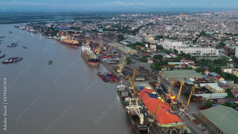 Hai phong, Vietnam Aug 2020 4k aerial video of Hai Phong Terminal 1 look from Hoang Van Thu Bridge during late afternoon