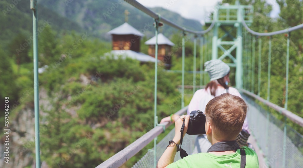 Little photographer in the Chemal, Altay. Little photographer in the Chemal, Altay.