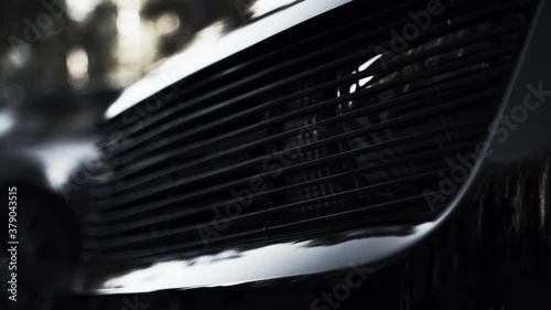Black aggressive muzzle of the car, close-up