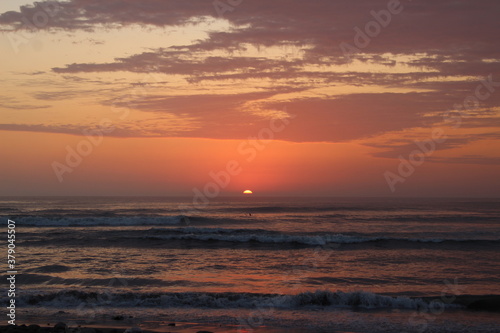 sunset at the beach © jherson