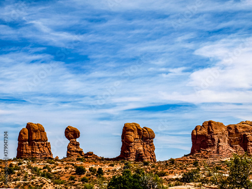 Rows of balancing rocks on top of giant sandstone boulders, Arches National Park, UT, USA