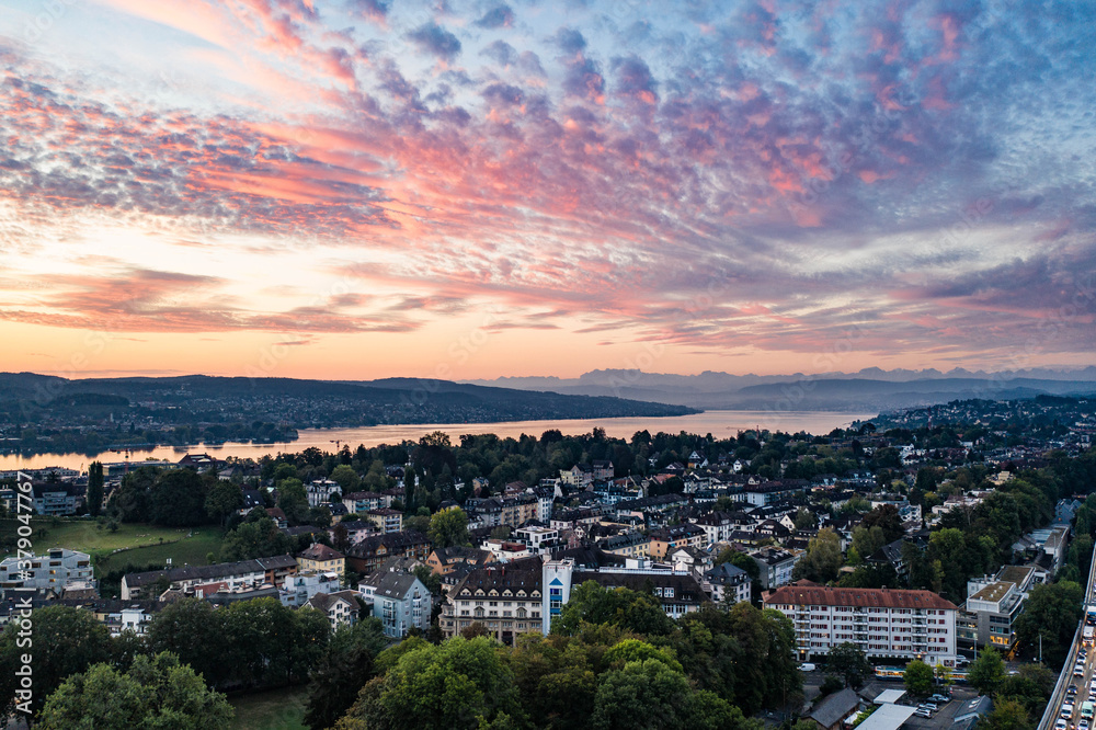 Sunrise over Zurich and the lake