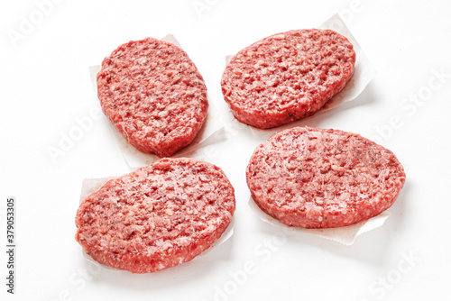  Raw minced homemade cutlets, on the white background
