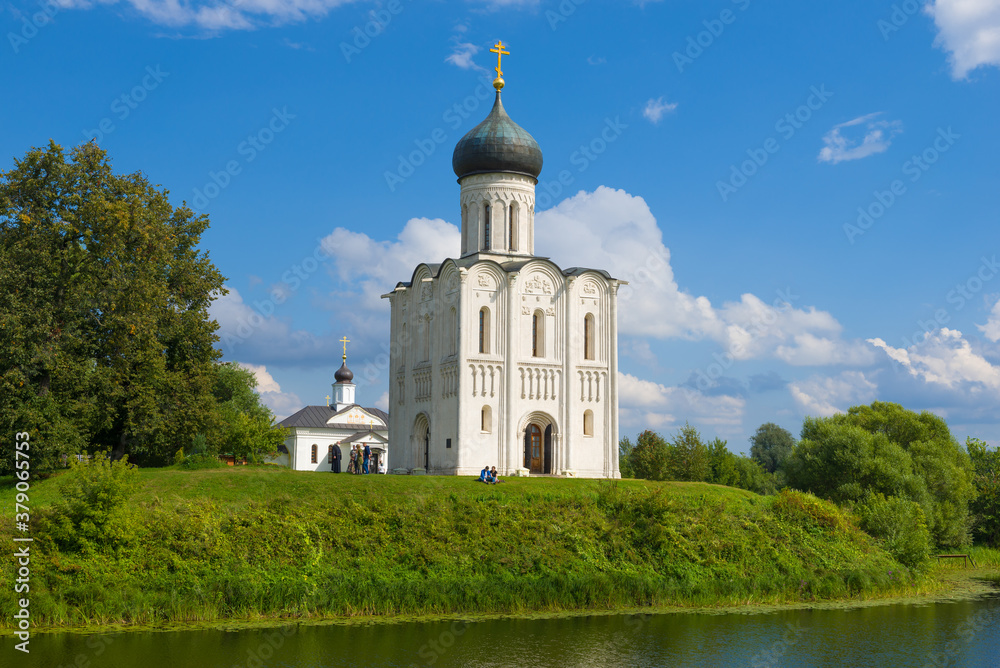 View of the Church of the Intercession of the Most Holy Theotokos on the Nerl on a sunny August day. Vladimir region, Russia