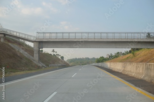 Pedestrian bridges that cross over toll roads
