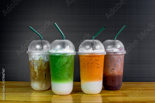 A close-up view of the drinks put into the cup, (iced tea, cocoa, chocolate) with pearls, is a popular menu in cafes and restaurants.