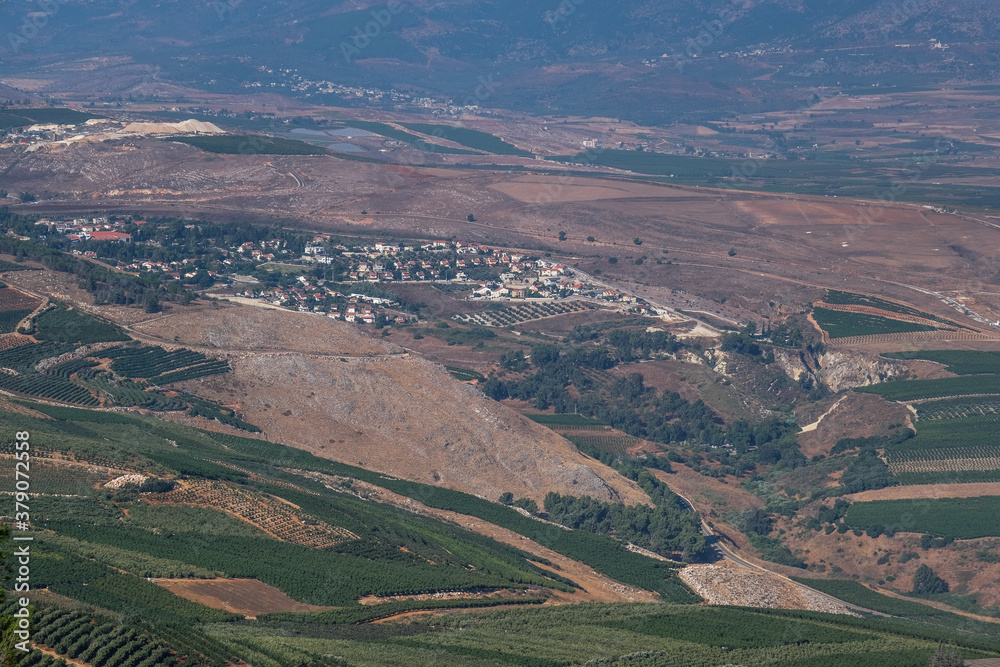 View of Southern Lebanon and Northern Israel with the concrete wall built along the international border, as seen from kibbutz Misgav-Am lookout point, Upper Galilee, Israel.