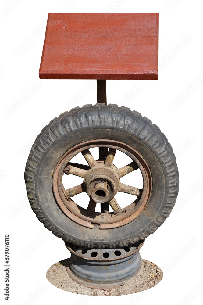 Obraz premium Information stand made of old wheels and wood isolated
