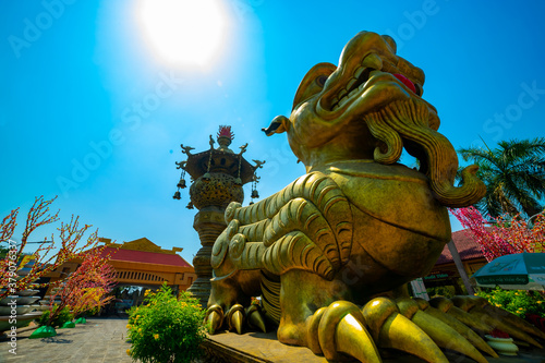 A Big Statue Guardian dog at Suoi Tien park in Ho Chi Minh wide shot photo