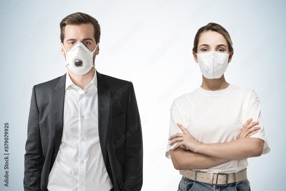 Man and woman in protective masks