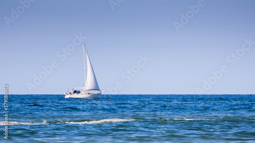 white sailing boat at sea Baltic © Piotr
