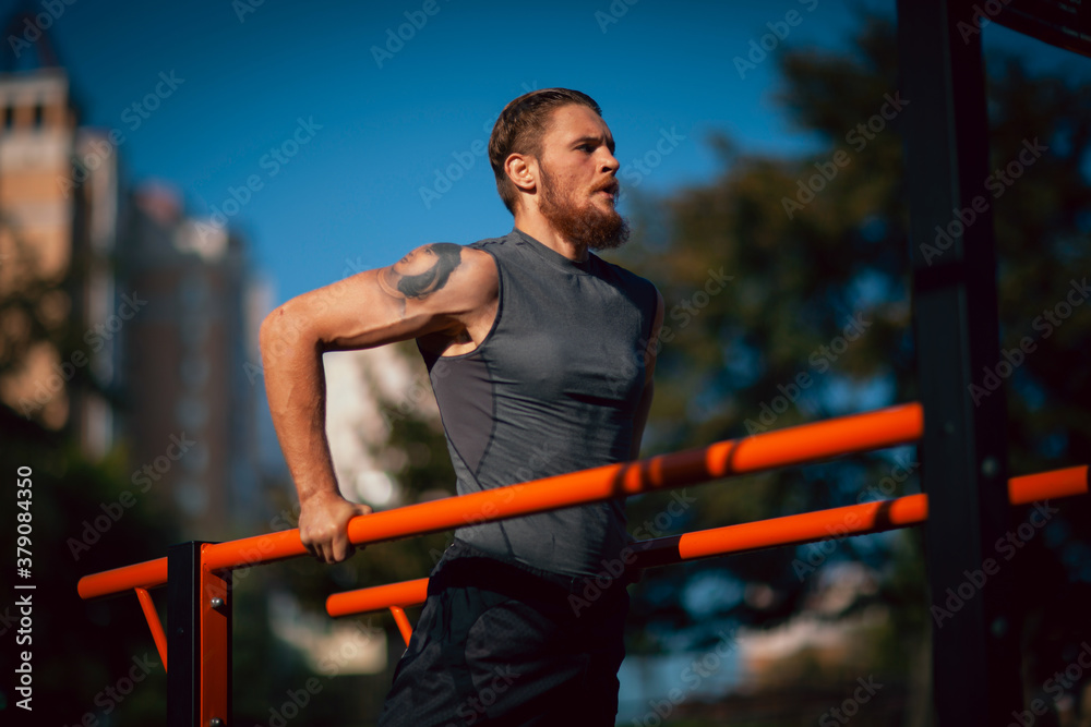 Fototapeta premium Athletic young man maker workout in morning
