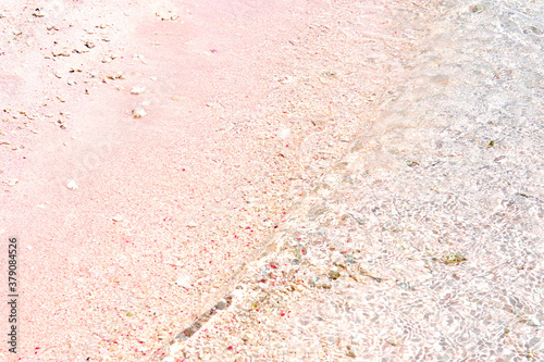 Pink Beach and Splash Wave in Komodo National Park, Indonesia photo
