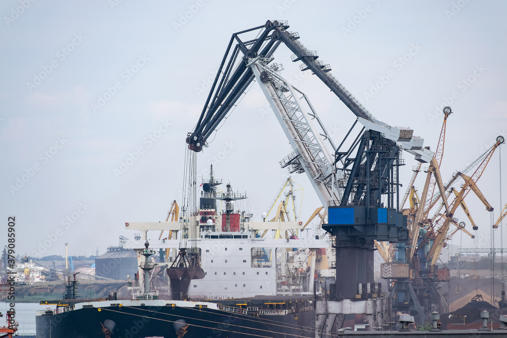 Cranes loading ship