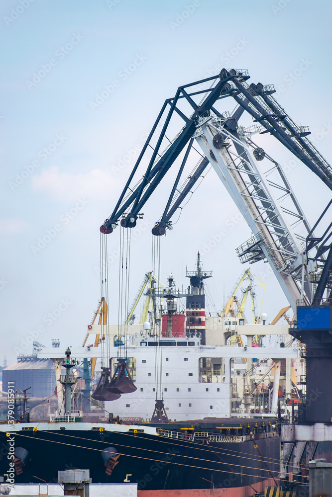 Cranes loading ship