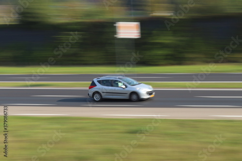 car panning on highway. © Maurin
