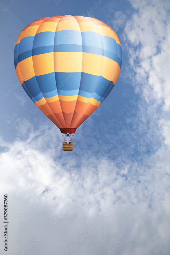 Fototapeta premium Hot air balloon set against a blue cloudy daytime sky