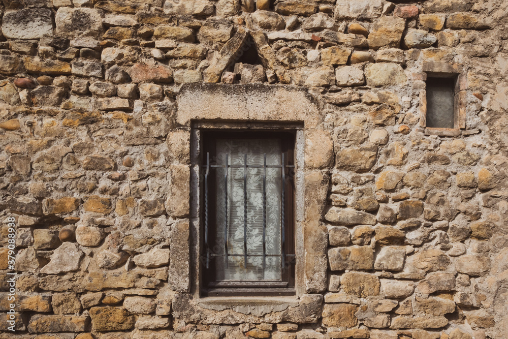 Window in an old stone wall