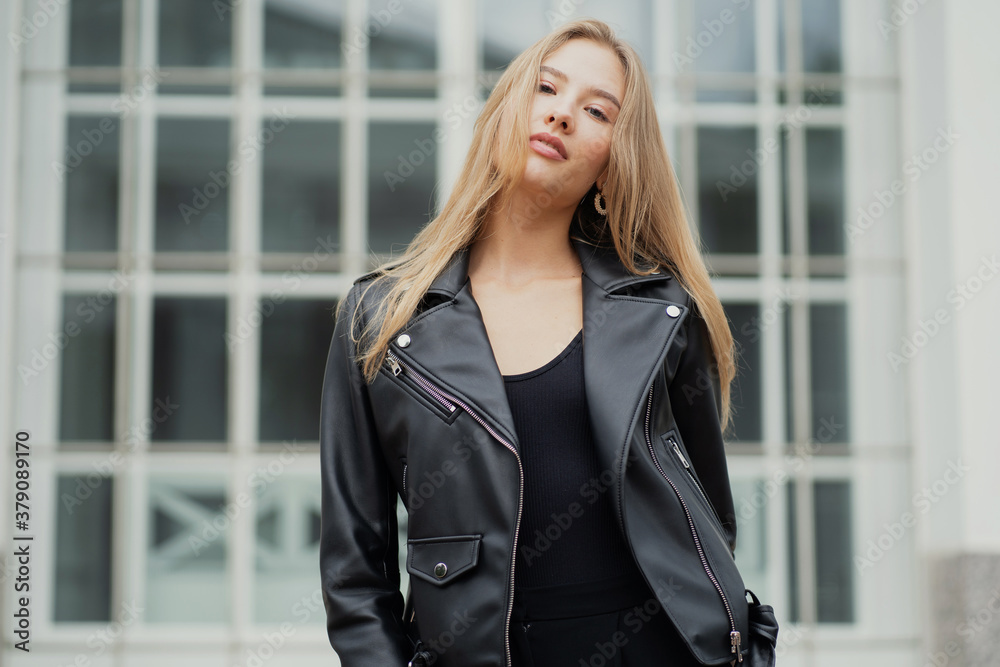 young fashion serious confident woman blonde Caucasian appearance ethnic. posing looking at the camera, straight hair young fashion serious confident woman blonde Caucasian appearance ethnic. posing looking at the camera, straight hair