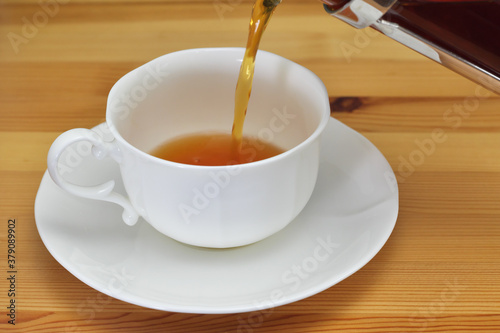 Tea poured into a tea cup