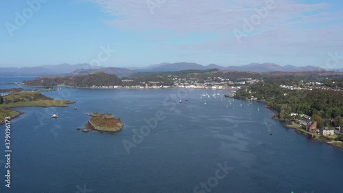 aerial view of the sound of kerrera and the island of kerrera near oban in the argyll region of the highlands of scotland during a clear blue calm day in autumn photo