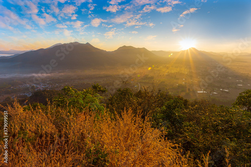 Mountain valley during sunrise. Beutiful natural landsscape in the summer time. photo