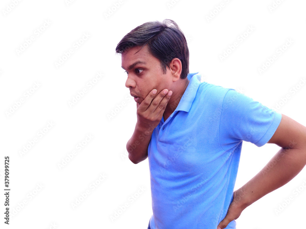 Shocked or surprised young man looking curiously what is the issue Shocked or surprised young man looking curiously what is the issue