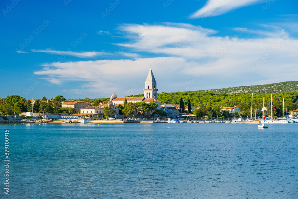 Old town of Osor between islands Cres and Losinj, Croatia, Adriatic seascape in foreground Old town of Osor between islands Cres and Losinj, Croatia, Adriatic seascape in foreground