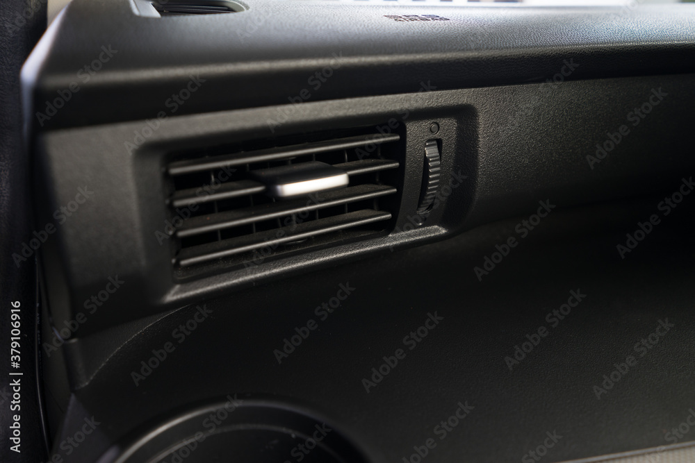Air conditioner vent grill in a modern car Air conditioner vent grill in a modern car