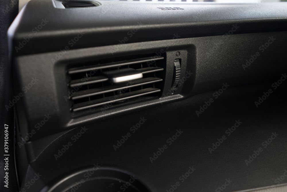Obraz premium Air conditioner vent grill in a modern car