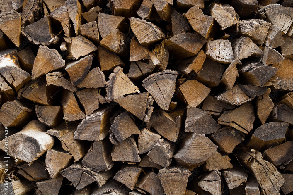Wall with firewood, wooden background, banner Wall with firewood, wooden background, banner