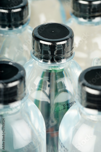Drinking mineral water bottles filled with plastic wrap