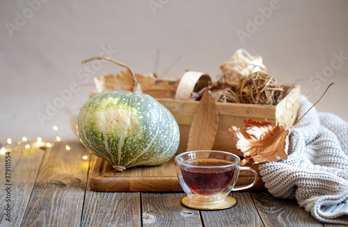 Cozy still life with tea and decorative items