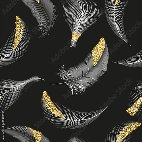 Vector black  and gold feathers collection, set of different falling fluffy twirled feathers on a white background.
